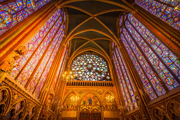 PARIS, FRANCE - OCTOBER 08: Stained glass windows of Saint Chapelle with rose window, medieval...