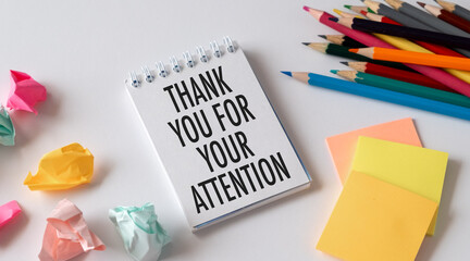 Creative concept Thank You For Your Attention text on notebook on white background.