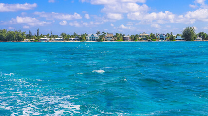 View of the Cayman Islands North Side shore from the pristine blue green turquoise Caribbean sea...