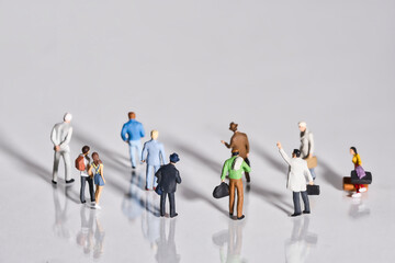 different people on a white background with shadows, close-up, miniature figures scene