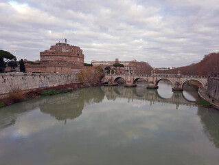 glimpse of the scenic Tiber river in Rome with Castel Sant'Angelo