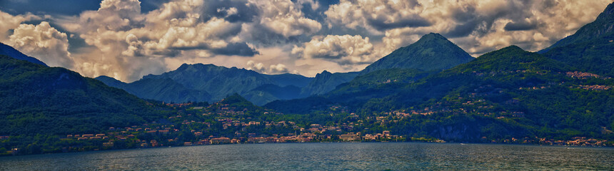 Fototapeta na wymiar Lake Como in Northern Italy’s Lombardy region at the foothills of the Alps. Landscape views from a local town, Europe.