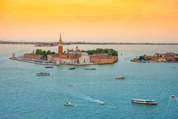 Aerial view of the island with the church of San Giorgio Maggiore, view from the Bell Tower (Campanile di San Marco), in Venice, Italy, at sunrise