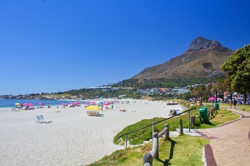 Beach in Cape Town with people and umbrellas