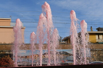 A view of a pink fountain. Ceriale, Italy - December 23, 2023.
