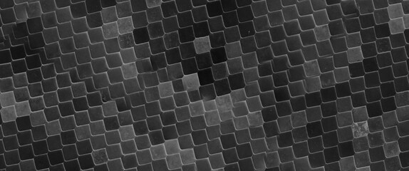 Abstract textured background with symmetrical scales in different shades of black