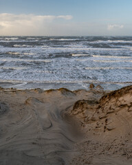 authentic scene from a furious  western coast of denmark during a western gale coming from the north sea