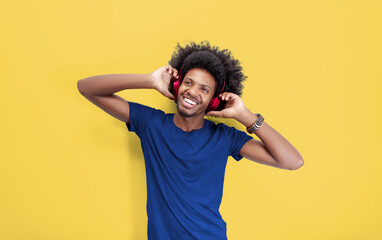 Musical Vibes: Smiling Youth in Blue Tee