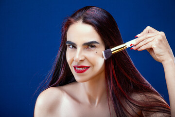 Obraz premium Portrait of Grace: Makeup Mastery and Long Locks
