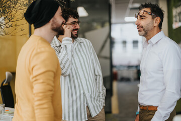 Colleagues discussing business growth and financial planning in a creative office, collaborating and sharing ideas to strategize a new project.