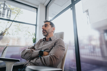 Fototapeta premium Senior man analyze statistics, collaborate, and strategize for business growth with his colleagues. Creative teamwork leads to success in marketing, sales, and investments.