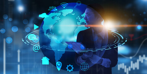 Businesswoman with digital model of Earth and icons on dark blue background