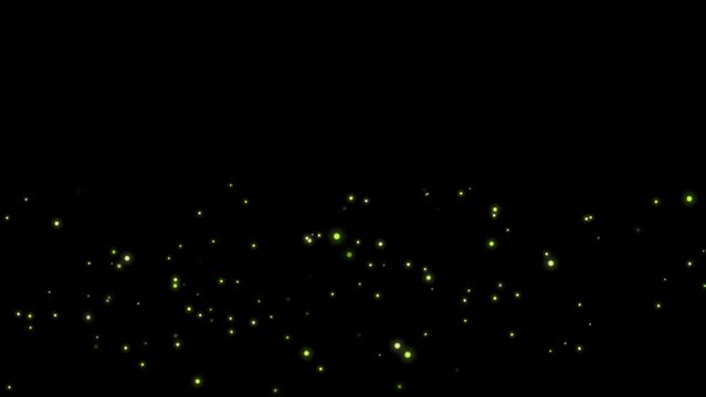 Flying fireflies glowing at night against black screen. Vfx bokeh insert overlay -4K Seamless Loop Animation