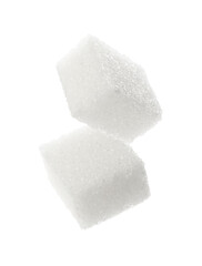 Cubes of sugar falling on white background