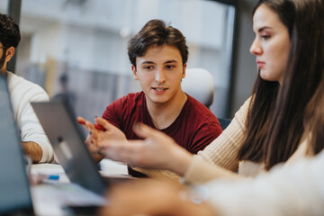 Young business team brainstorming marketing strategy for success.