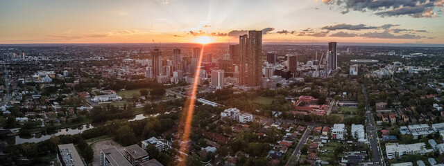 Panoramic aerial drone view of Parramatta cbd in Sydney, NSW Australia during a late afternoon sunset in December 2023 - obrazy, fototapety, plakaty