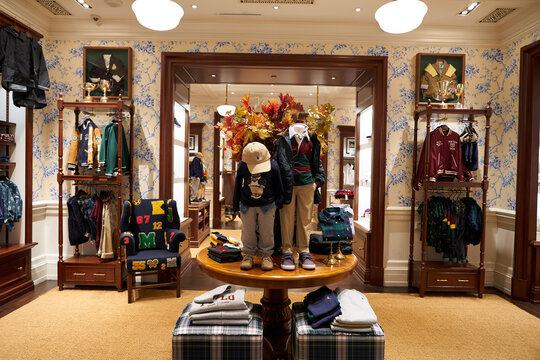 SINGAPORE - NOVEMBER 05, 2023: children's apparel displayed at Ralph Lauren store in the Shoppes at Marina Bay Sands. Ralph Lauren Corporation is an American publicly traded fashion company.