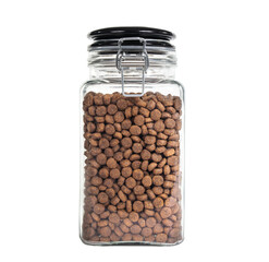 Isolated glass jar with kibbles, treats or snacks for cats or small dog. air tight containers for food to stay fresh. Glass jar with wire closure. Pet food background or storage. Transparent