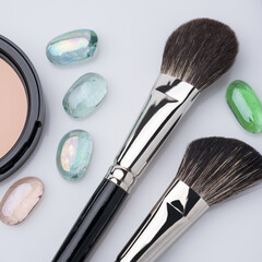 Make up brushes, eyeshadows and powder view