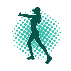 Silhouette of a woman doing aerobic move. Silhouette of a gym sporty person doing workout.