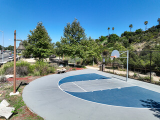 Recreational facilities with basketball court in residential community park in San Diego, Califronia, USA