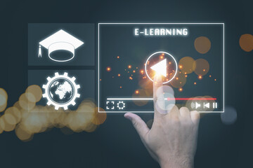 A hand of man pointing on virtual screen video e-learing study online. Watching video on the internet. Video semnar online, education on internet digital online, e-learning concept.