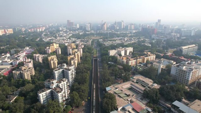 An Aerial shot of Delhi metro going in the underground Tunnel at Connaught Place in New Delhi, India

