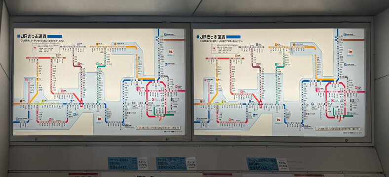 Konohana Ward, Osaka, Japan. Dec 24, 2023. A couple of screens with a Japan Rail Maps.