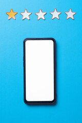 One star rating with white blank phone screen on blue background. Customer online satisfaction...