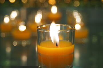 candle in glass