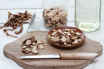 Preparation of herb tincture from fresh roots of  Rhodiola rosea.  Commonly known as  golden root, rose root, Arctic root or king's crown.