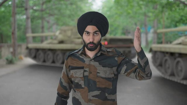 Angry Sikh Indian Army man shouting on someone