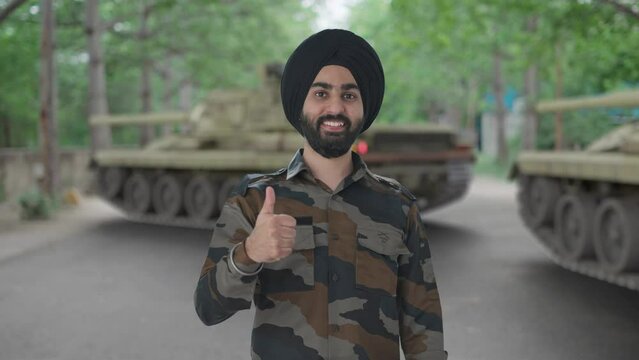 Happy Sikh Indian Army man showing thumbs up