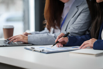 Two Asian businesswomen working together, meeting and discuss of new business project, professional people.