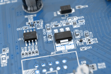 Macro shot of Circuit board with resistors microchips and electronic components background....