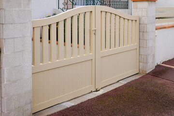 steel classic beige round color sand metal gate fence of house street view