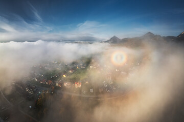An aerial view of the autumn Pieniny Mountains captured on an October morning. Mists and low light...