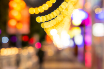 defocused background of a street with lightings at night
