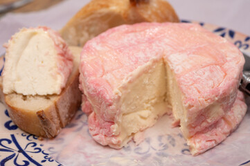 Cheese collection, French fresh white soft goat cheese soaked in rose champagne wine