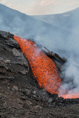 Eruptive vent with lava emis at the top of the Etna volcano