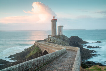 One of the most beautiful lighthouses at sunset. Phare de Petit Minou on the coast of Brittany, France, Europe