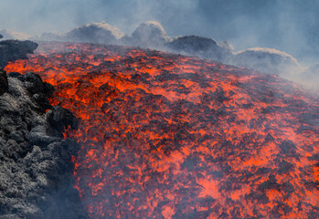 Eruptive vent with lava emis at the top of the Etna volcano