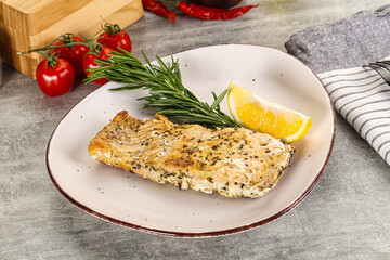 Baked salmon fish served rosemary