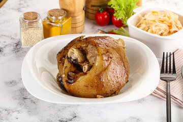 Baked pork knee with spices