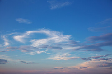 summer evening, sunset in yellow, orange and pink with clouds, background