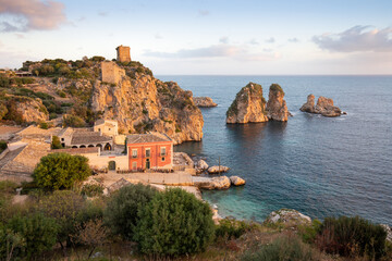 Fototapeta na wymiar Unbelievable scene of Tonnara di Scopello. Popular travel destination on Mediterranean sea. Location: Scopello, Province of Trapani, Sicily, Italy, Europe. Traveling concept background. 