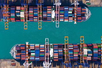 Global transportation and logistic business. Aerial top view over international containers cargo...