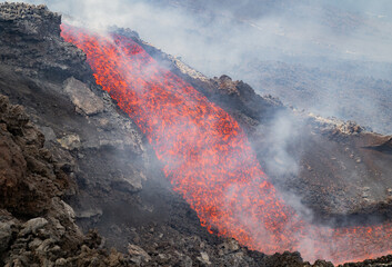 Eruptive vent with lava emis at the top of the Etna volcano