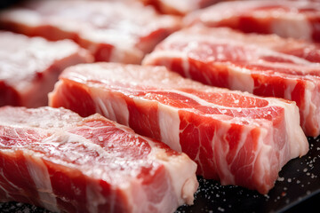 Close up of pieces of raw pork belly meat - obrazy, fototapety, plakaty