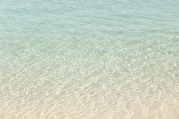 Naklejka premium Abstract texture of water on sand beach